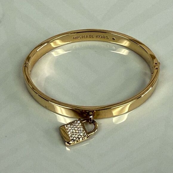 Michael Kors Goldtone Iconic Pace Lock Hinged Bracelet - Picture 5 of 7